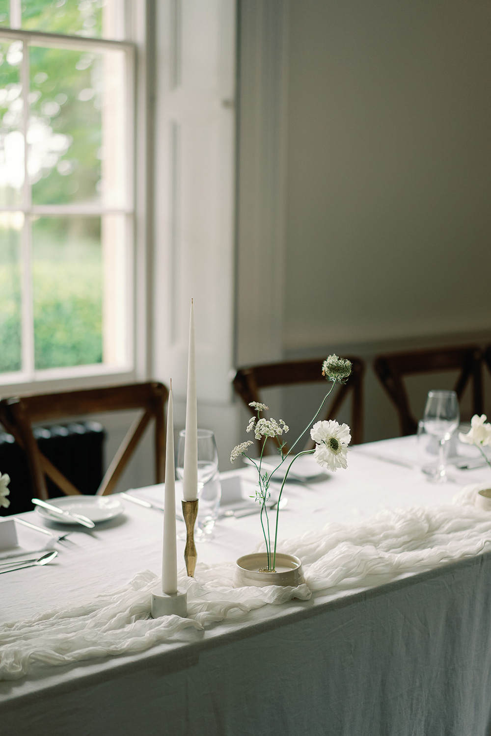 Minimal table styled with kenzan holder arrangement. Photo ©Jessica Lily Photography